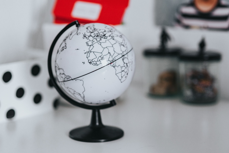 items, toys, world map, planet earth, wall, white color, christmas, day, communication, high angle view, sphere, selective focus, indoors, various, no people