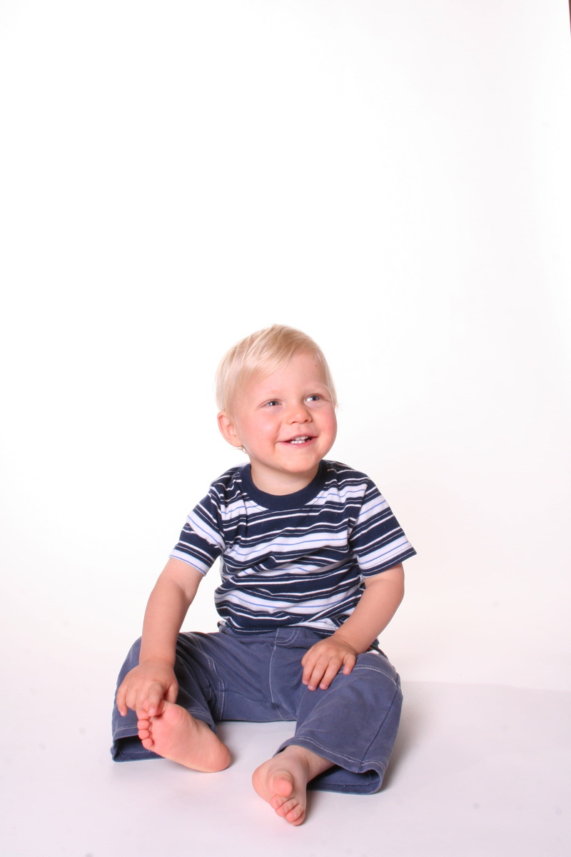 boys, cheerful, one Person, males, sitting, babies only, beside, full length, looking At Camera, copy space, childhood, Portrait, baby, lifestyle, looking
