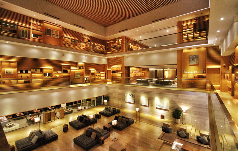 lobby, absence, hotel, indoors, domestic room, photography, ceiling, electric lamp, flooring, modern, illuminated, wealth, no people, luxury hotel, seat