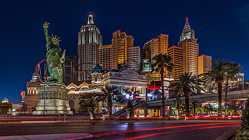 illuminated, building exterior, avenue, hotel, sky, light trail, buildings, light, office building exterior, skyscraper, way, night, city, city street