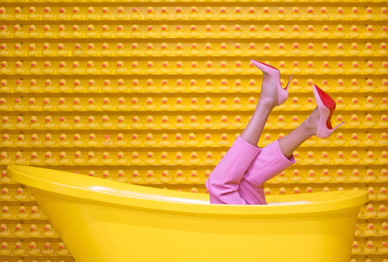fun, creativity, enjoyment, indoors, bathtub, metal, louboutin, steel, domestic life, one person, lifestyles, fashion, multi colored, human hand, yellow