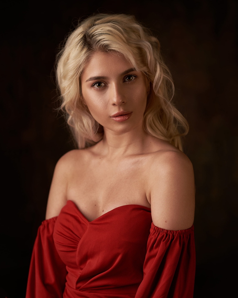 red clothing, wavy hair, makeup, women, simple background, blonde, 1080P, looking at viewer, Radmila Dzhanaeva, lip gloss, bare shoulders, dress, Max Pyzhik