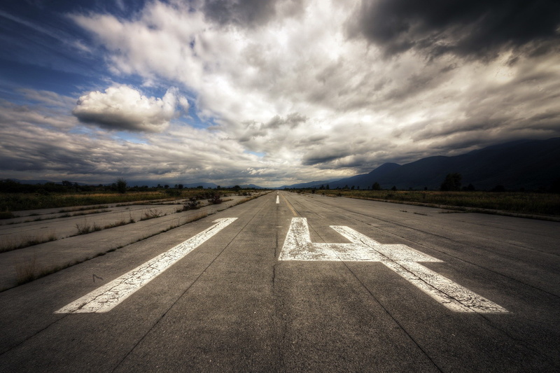 numbers, day, sign, sky, airport runway, the way forward, cloud - sky, no people, landscape, vanishing point, direction, road marking, road, outdoors, symbol