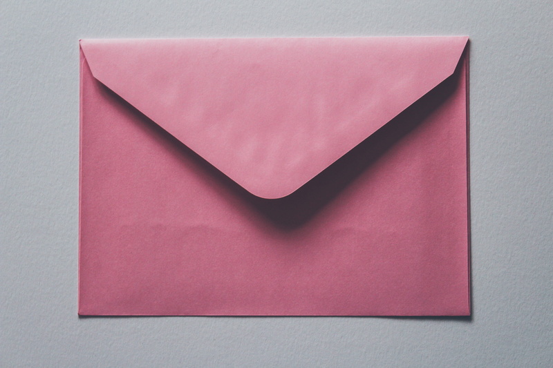 close-up, emotion, pink color, 5K, envelope, high angle view, art and craft, love, text, blade, still life, wax seal, single object, letter opener, indoors