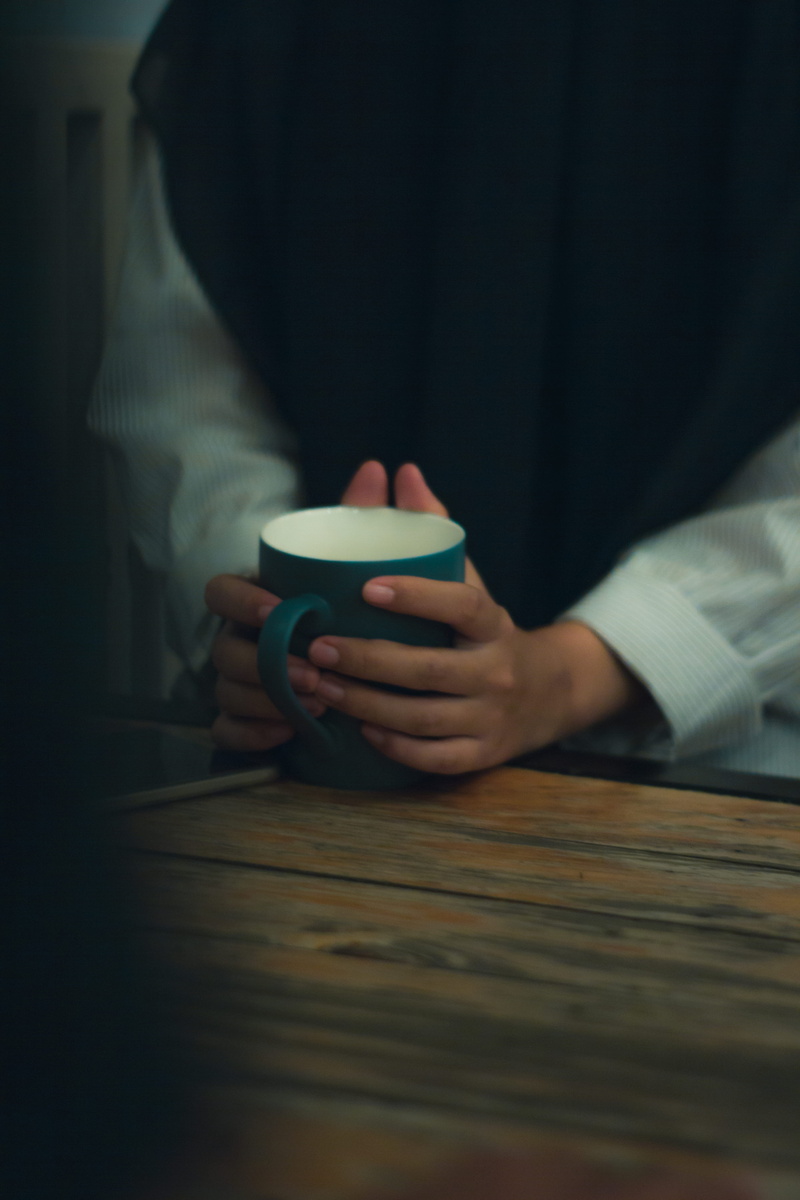real people, indonesian, glass, sitting, hardwood, relax, coffee cup, islam, lifestyles, human hand, drink, leisure activity, apparel, 5K, deep, clothing