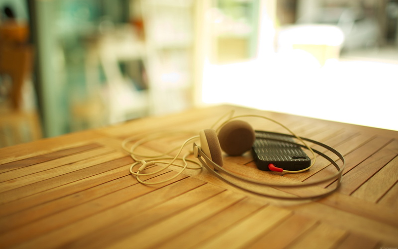 glasses, technology, table, personal accessory, focus on foreground, day, iPhone, 2K, connection, wood - material, portability, copy space, communication