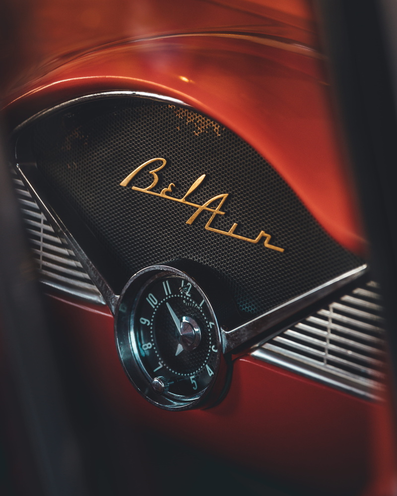 text, technology, steering wheel, control, emblem, mode of transportation, red, logo, number, close, interior, tire, automobile, retro styled, car interior