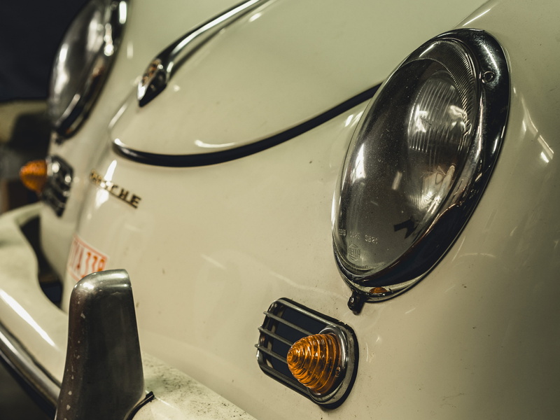 no people, grille, torch, logo, badge, machine, neon, car wheel, tire, arts culture and entertainment, trademark, emblem, retro styled, hubcap, reflection