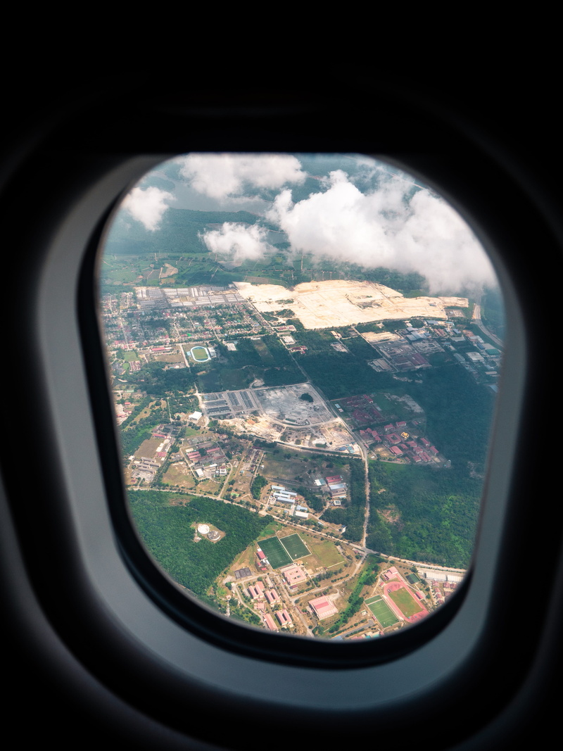 porthole, cityscape, photography, curtain, outdoors, home decor, window shade, light, shutter, transparent, brick, mode of transportation, air vehicle