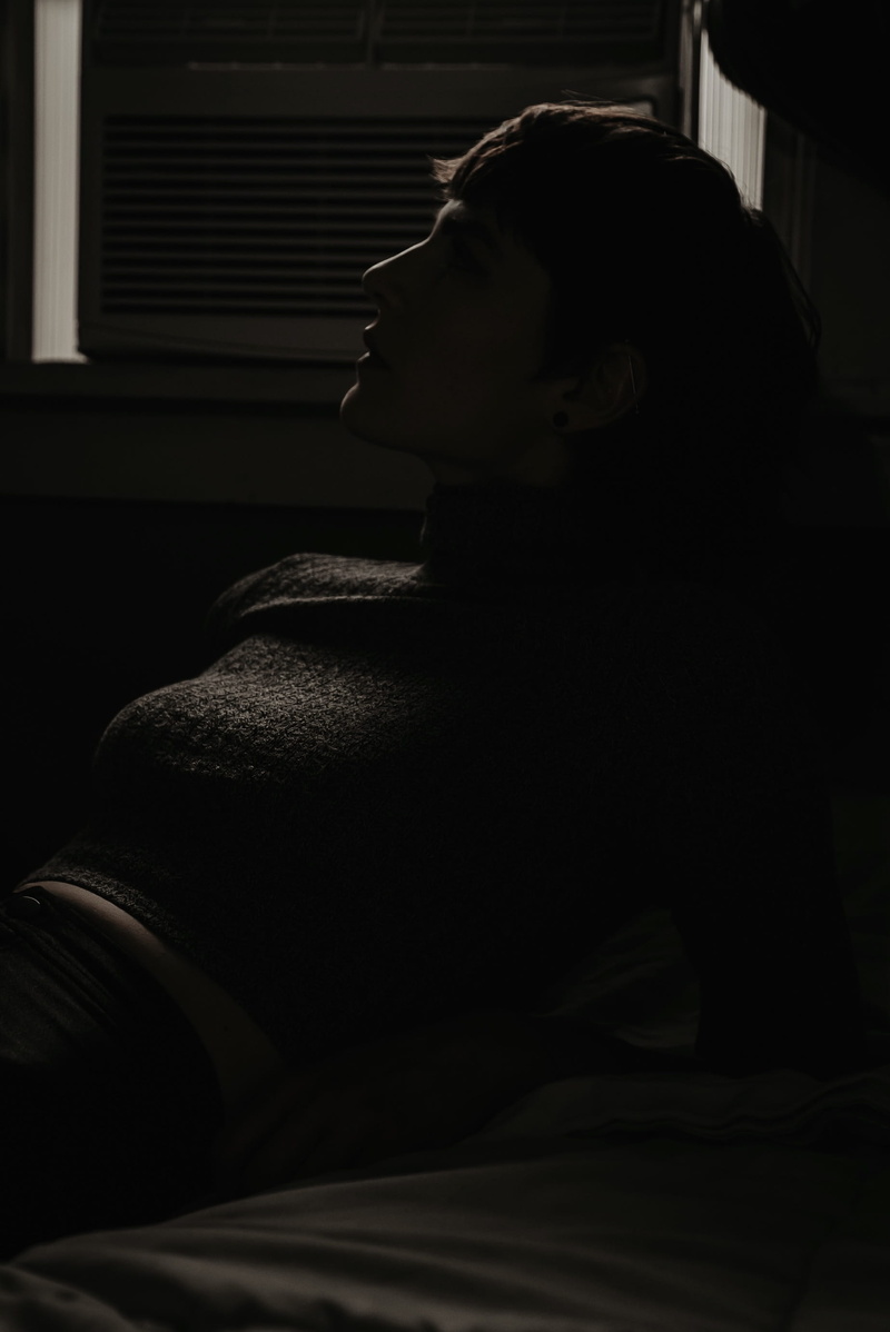 woman, one animal, window, shutter, light, electronics, camera, banister, contemplation, indoors, relaxation, united states, flare, bed, real people, pregnant