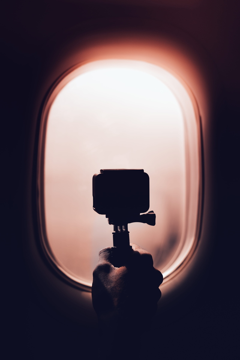 shutter, sketch, electric lamp, porthole, lamp, single object, lighting equipment, sphere, person, flare, hole, sunlight, binoculars, hand, illuminated