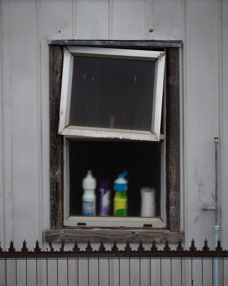 flare, open, reflection, cylinder, day, female, plastic, bottles, brick, wood - material, built structure, no people, curtain, kid, light, residential district