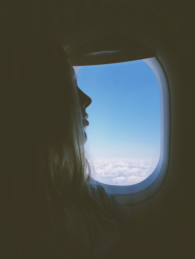 boutique, day, hair, shop, looking through window, air vehicle, nature, outdoors, lifestyles, algae, hole, adult, leisure activity, performer, sky, flying