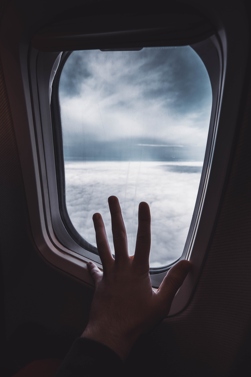 transportation, female, car seat, woman, leisure activity, mode of transportation, human body part, human hand, hole, person, air vehicle, blonde, nature