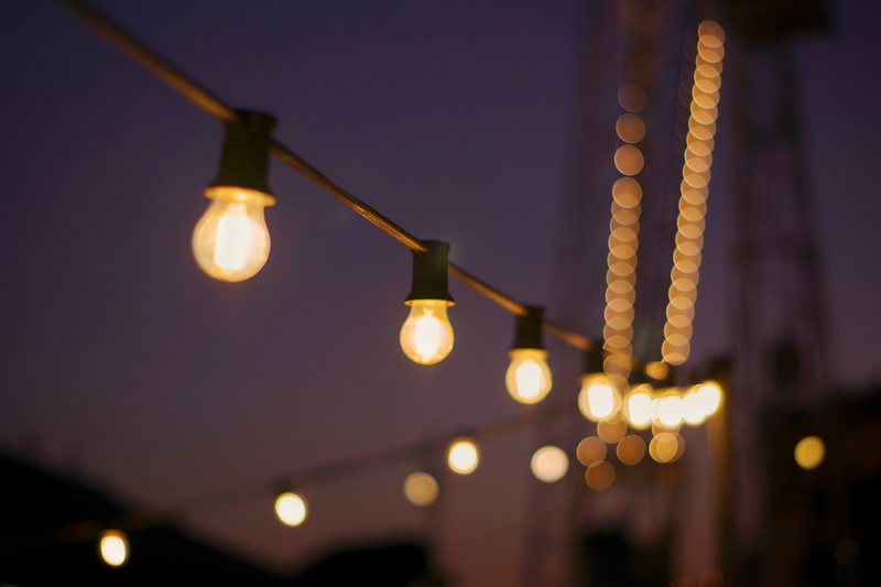 street, low angle view, built structure, light - natural phenomenon, lightbulb, honey, hanging, light, no people, electric lamp, lighting equipment, stage