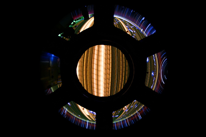 indoors, illuminated, multi colored, electric lamp, light fixture, long exposure, led, lighting equipment, black, circle, glass - material, geometric shape