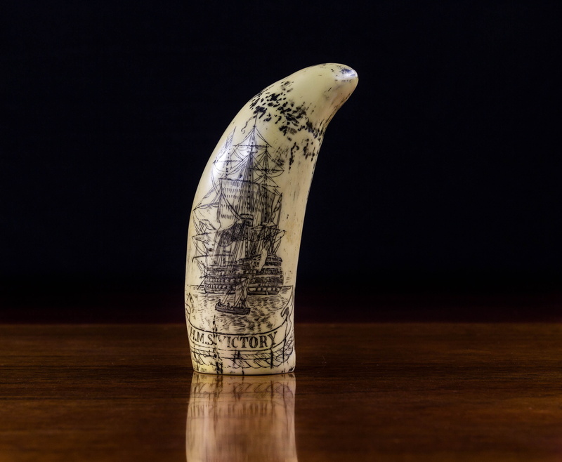 table, studio shot, business, economy, Engraving, smiling, Scrimshaw, communication, no people, reflection, animal representation, Carving, representation