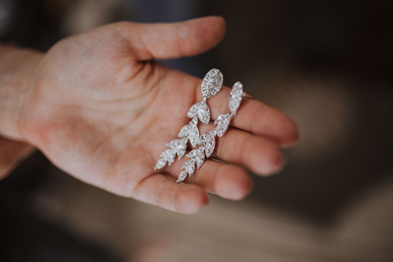 5K, indoors, Preparations, real people, shiny, holding, diamond, close-up, white, necklace, people, ring, diamond - gemstone, adult, jewelry, wedding