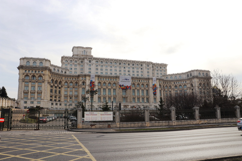 history, palace, romania, sky, incidental people, built structure, building, outdoors, cloud - sky, transportation, parliament, architectural column, bucharest