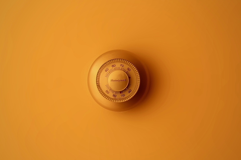 orange, logo, dial, close-up, copy space, wall, orange background, yellow, shape, appliance, thermostat, orange color, studio shot, 5K, cut out, heat - temperature