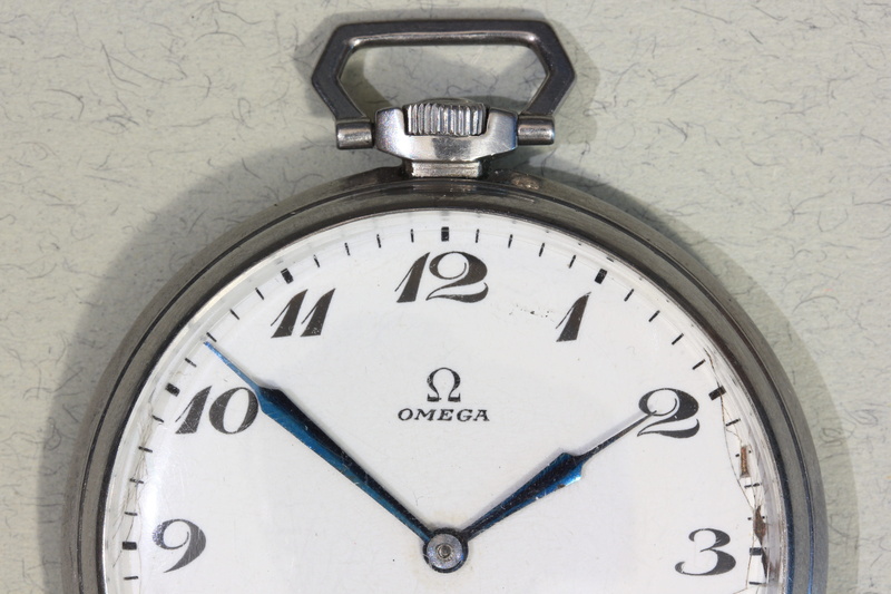 studio shot, pocket, day, pocket watch, dial, clock hand, omega, indoors, handwinding, wall - building feature, timekeeping, accuracy, circle, number, clock