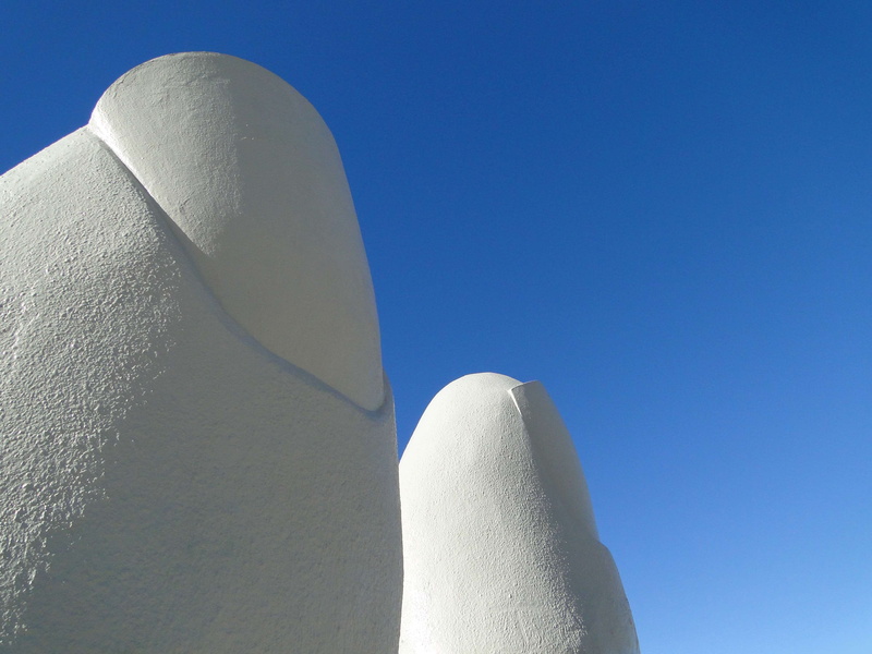sunny, sky, clear sky, building exterior, travel destinations, punta del este, horizon, royalty, 2K, hand, built structure, day, immensity, fingers, stone sculpture