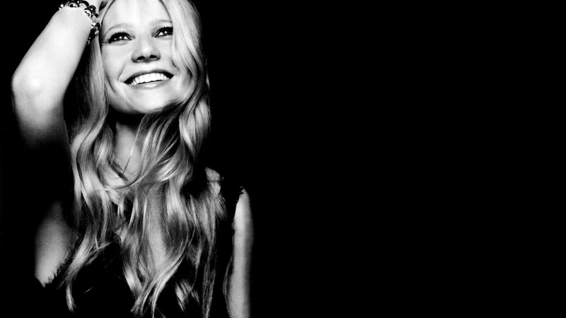 copy space, arms up, long hair, teenager, hairstyle, blond hair, actress, studio shot, black background, Gwyneth Paltrow, smiling, front view, hair, indoors