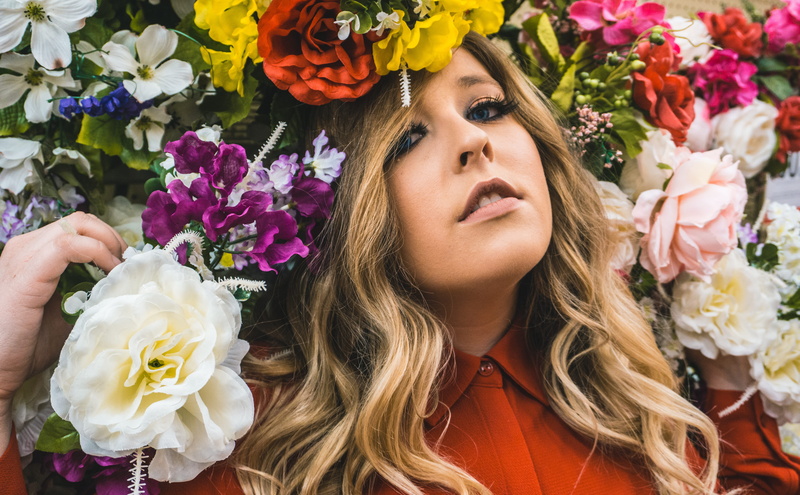 posing, nature, daytime, adult, hobby lobby, bunch of flowers, floral, rainbow, near, beauty in nature, flower, garden, rose - flower, smelling, flower head