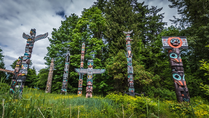 stanley park, green color, sky, text, green, canada, nature, no people, plant, communication, totem pole, vancouver, guidance, beauty in nature, road sign