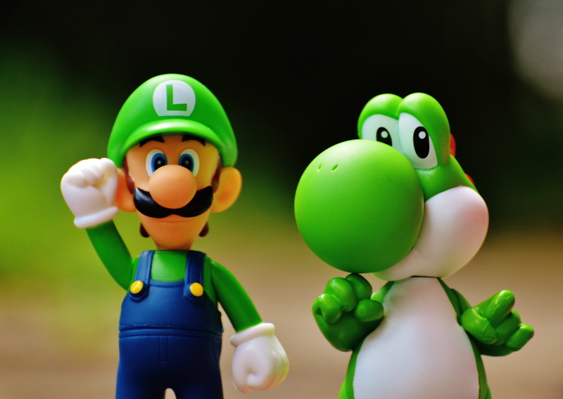 marios brother luigi, mario, humor, cartoon, character, arcade game, plastic, yoshi, 5K, two objects, no people, human representation, game console, cute