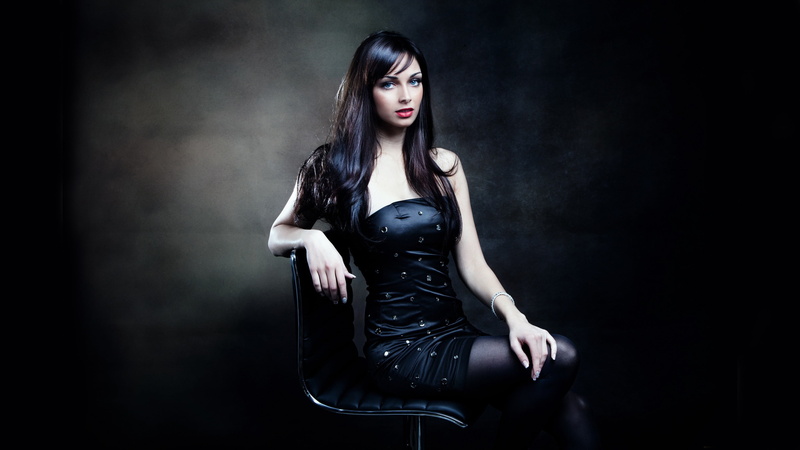 clothing, studio shot, sitting, long hair, hairstyle, 2K, elegance, gothic style, black hair, contemplation, adult, beauty, fashion model, black color
