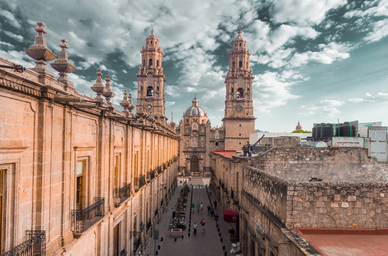 cloud - sky, sky, tower, incidental people, religion, morelia, church, travel destinations, cathedral, built structure, history, city, spring, nature, 4K