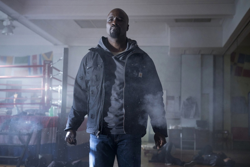 focus on foreground, casual clothing, indoors, real people, luke cage, 2K, representation, one person, hd, standing, city, completely bald, young adult
