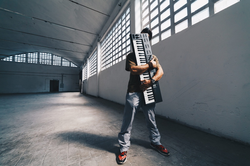 people, musician, person, empty, standing, musical instrument, young Adult, model, males, 5K, modern, caucasian Ethnicity, hugging, full Length, pose