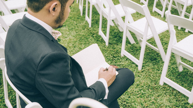 men, males, holding, reading, occupation, groom, well-dressed, suit, businessman, people, activity, vow, adult, business person, busy, notebook, one person