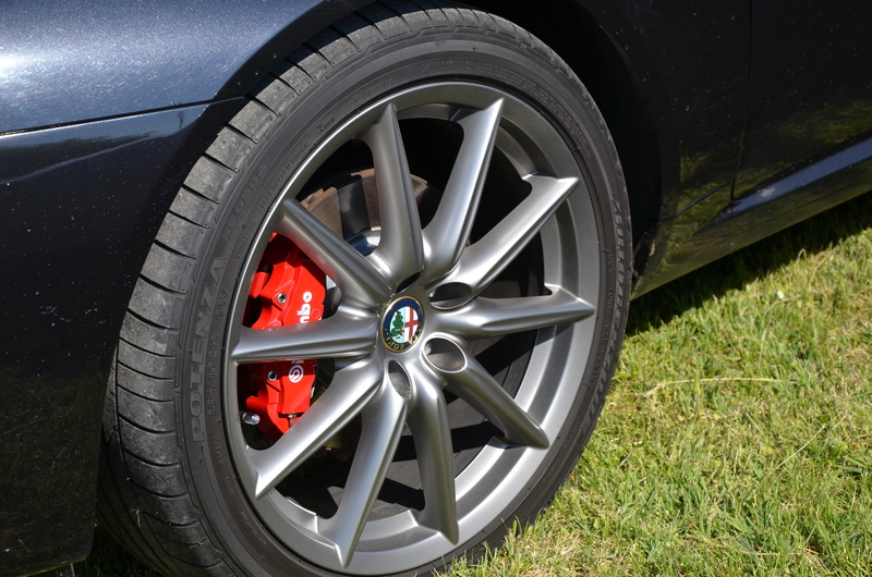 no people, car, grass, motor vehicle, luxury, alu, nature, transportation, chrome, close-up, rim, travel, alpha, day, mode of transportation, outdoors