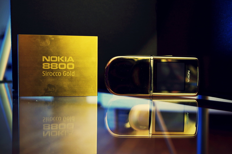phone, glass - material, black color, reflection, food and drink, information sign, indoors, communication, text, Nokia 8800, two objects, 2K, Nokia, metal