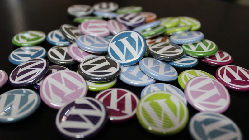 in a row, abundance, blogging, close-up, high angle view, badges, choice, indoors, table, collection, sweet food, wordpress, cms, variation, black background