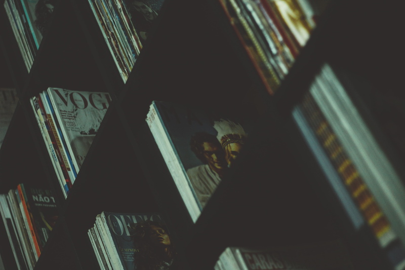 close-up, library, low angle view, rack, black, books, one person, reading, window, building, illuminated, indoors, night, day, technology, wood - material