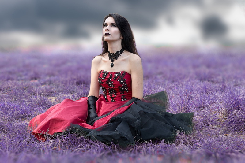 hairstyle, gothic, sitting, one person, daytime, surreal, fashion, grass, beautiful people, one woman only, gloomy, black, 1080P, female, attractive, field