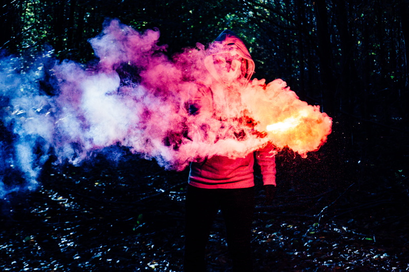colored smoke, holi, pink color, denmark, smoke, motion, front view, holding, outdoors, colorful smoke, red, men, smoke grenade, real people, three quarter length