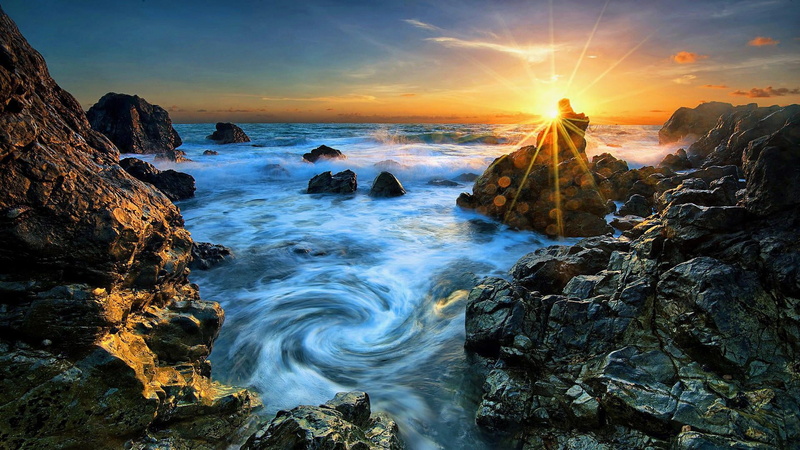 sunset, beauty in nature, outdoors, scenics - nature, horizon over water, sea, flowing water, tranquility, sky, cloud - sky, solid, nature, rock formation