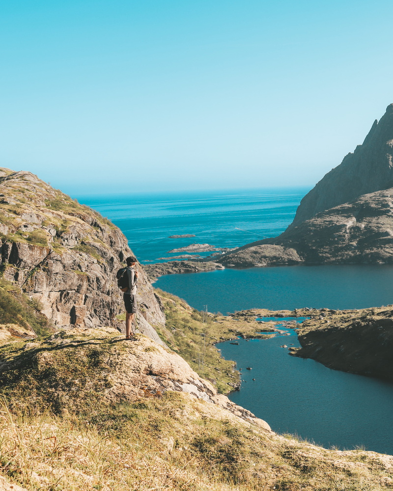 blue, man, day, no people, edge, hike, tranquil scene, clear sky, idyllic, earth, lake, rock, standing, rocky coastline, ocean, 4K, cliff, water