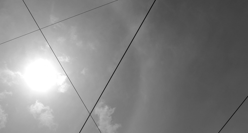 glass, no people, technology, sunlight, telephone line, outdoors, sun, beauty in nature, power cable, fuel and power generation, lines, power line, electricity