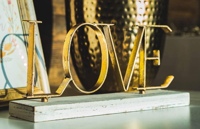 decorative, top, brass, still life, letter, photography, no people, surface, text, circle, focus on foreground, closeup, love, letters, wood - material