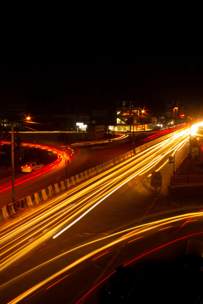 street light, blurred motion, scenery, motion, tunnel, transportation, highway, outdoors, on the move, flare, no people, speed, urban, intersection, asphalt