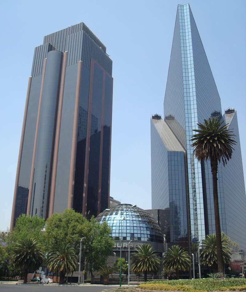 high, palm tree, clear sky, skyscraper, building, travel destinations, no people, tropical climate, skyscrapers, built structure, cityscape, sky, nature
