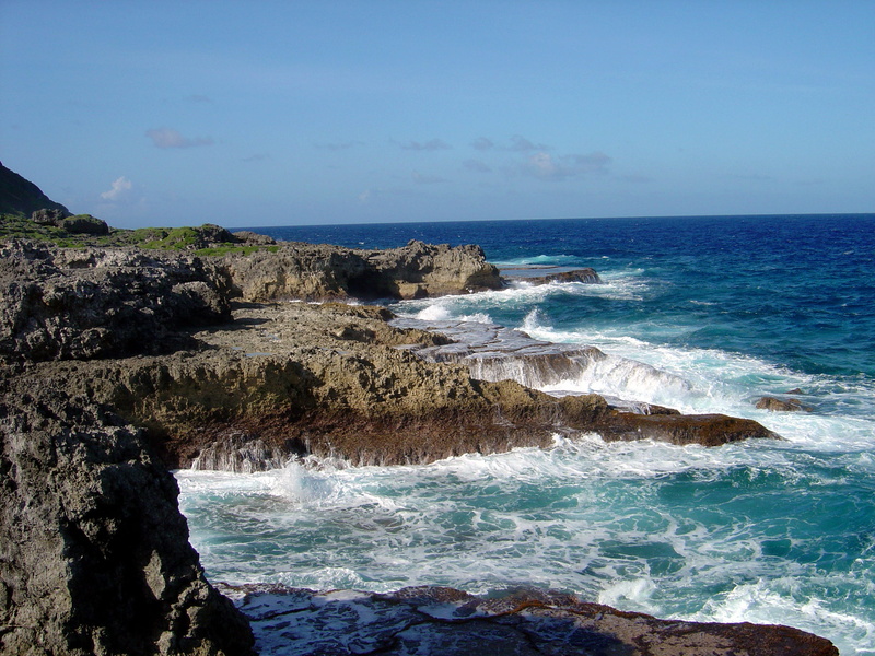 motion, water, outdoors, power in nature, pacific Ocean, landscape, shoreline, scenics - nature, surfing, Coastline, rock - Object, Guam, sea, wave, day