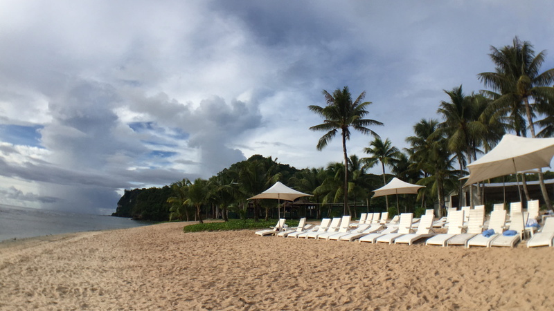 thatched roof, tranquil scene, beauty in nature, scenics - nature, nature, lounge chair, tranquility, sand, sky, tree, palm tree, no people, beach, water