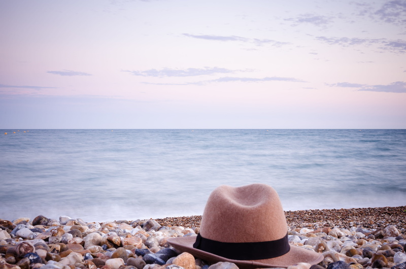 rock, rock - object, water, sky, real people, united kingdom, looking at view, bognor regis, pebble, holiday, sea side, land, one person, solid, beauty in nature
